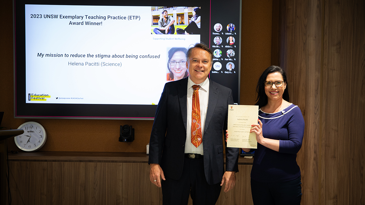 Helena Pacitti receiving her Exemplary Teaching Practice Award from the Scientia Education Academy’s Deputy Director Peter Heslin