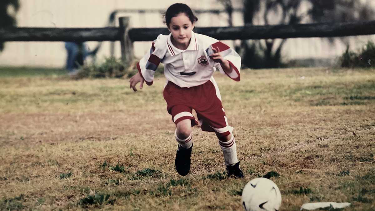 Jodie Pestan playing soccer aged 6