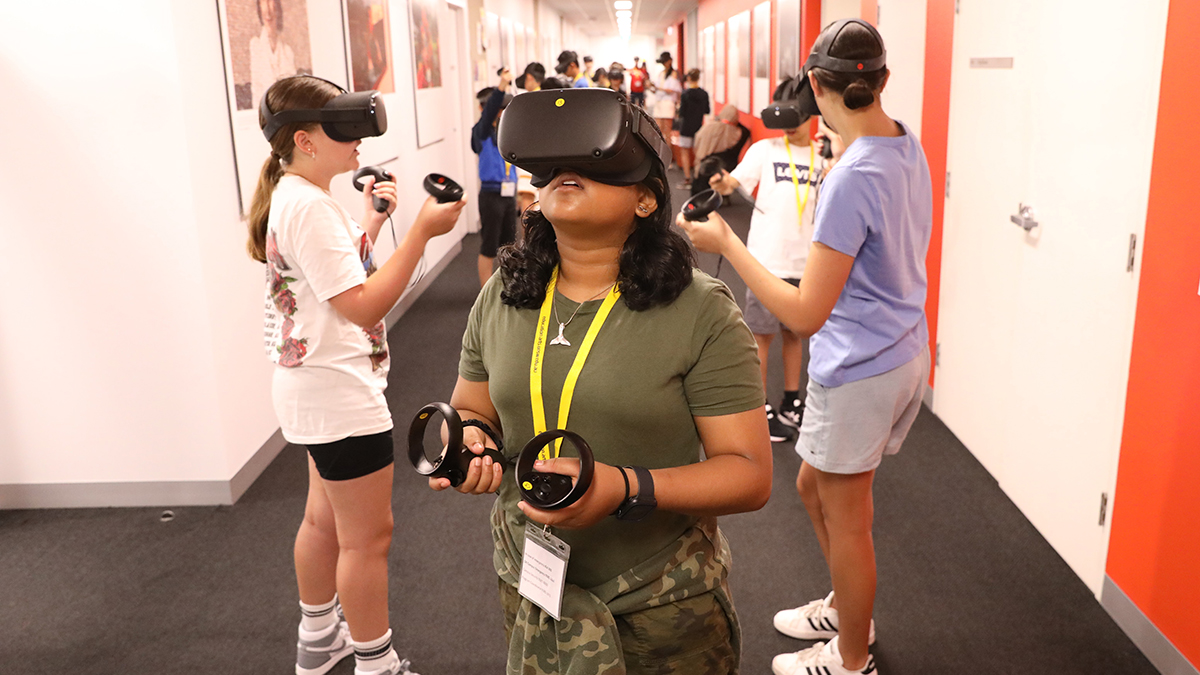 School students wearing VR headsets