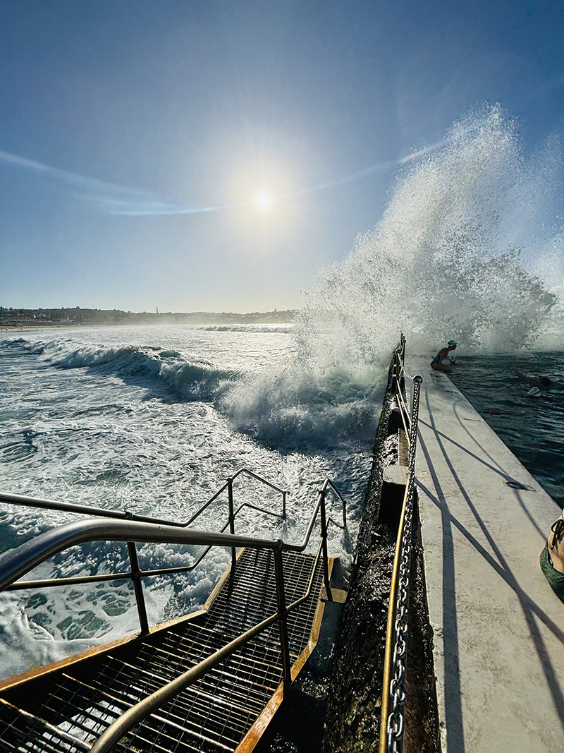 Water spraying over the edge of a sea pool