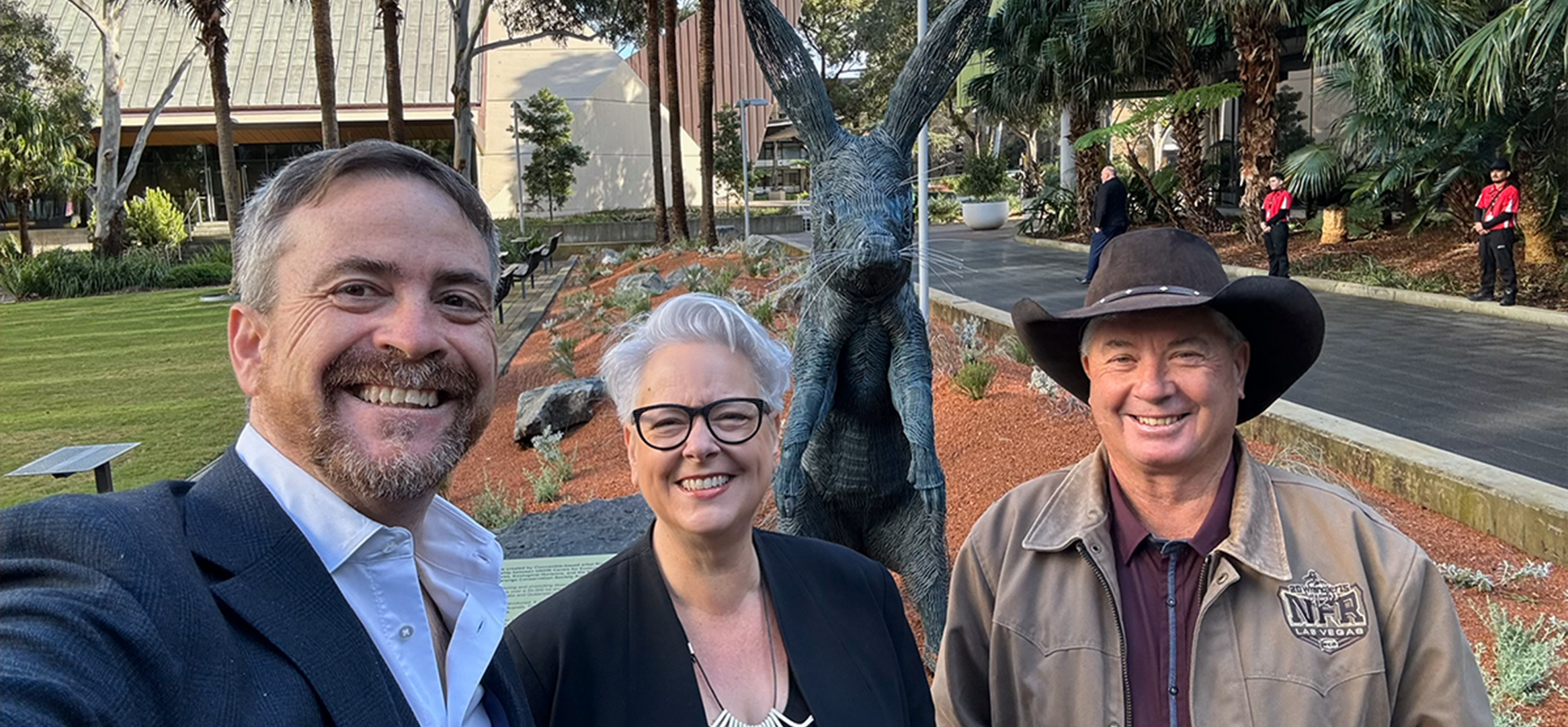 UNSW Vice-Chancellor Professor Attila Brungs, Minister for Climate Change, Minister for Energy, Minister for the Environment, and Minister for Heritage the Hon. Penny Sharpe and artist Brian Campbell unveil the bilby sculpture and garden on Michael Birt Lawn.