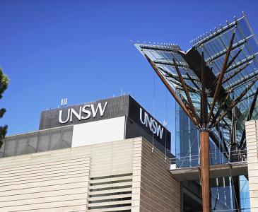 Scientia building with UNSW library in the background against a blue sky