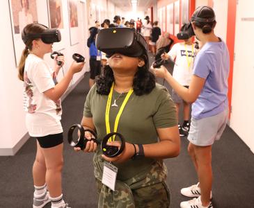 School students wearing VR headsets