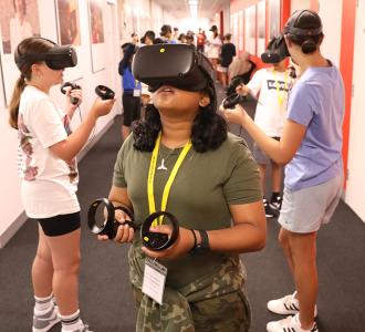 School students wearing VR headsets