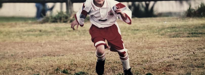 Jodie Pestan playing soccer aged 6